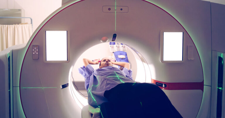 a photo of a person in a CT scanner looking for renal cell cancer