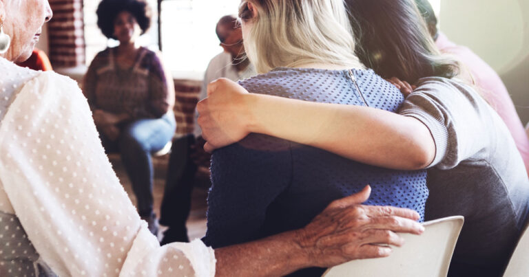 Photo of people in a support group