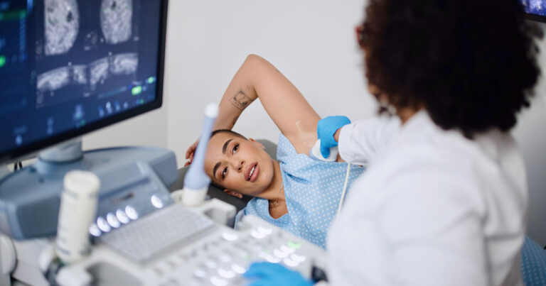 Image of woman getting a breast ultrasound